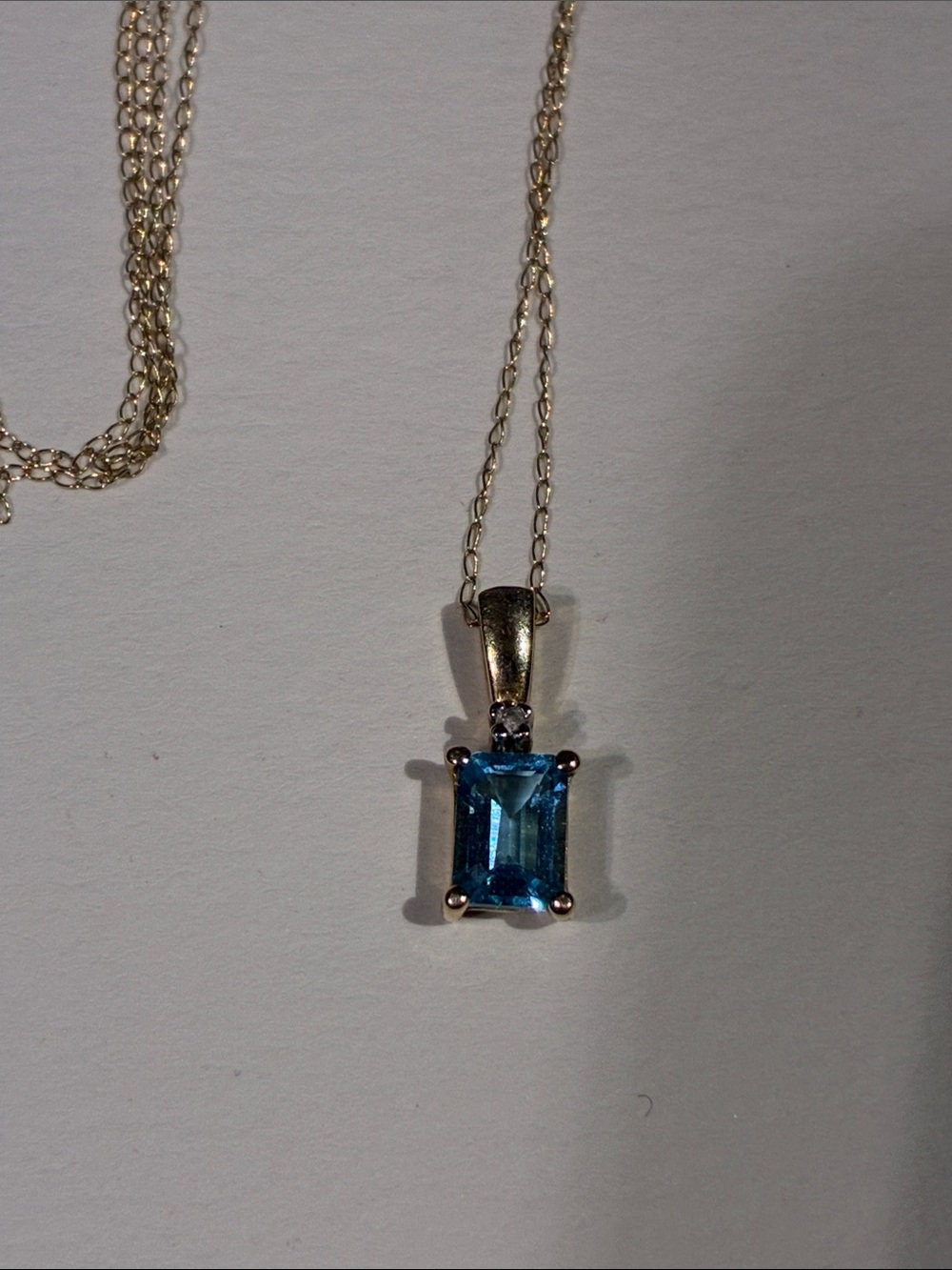 10K  Blue Emerald-Cut Topaz Pendant Necklace and 19 Inch 10K Chain 1.38 Grams